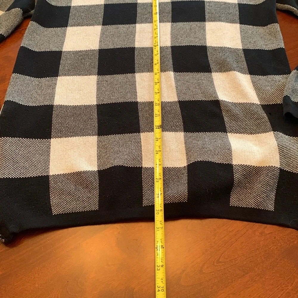 Divided Black and Cream Crewneck Sweater with Bold Check Pattern